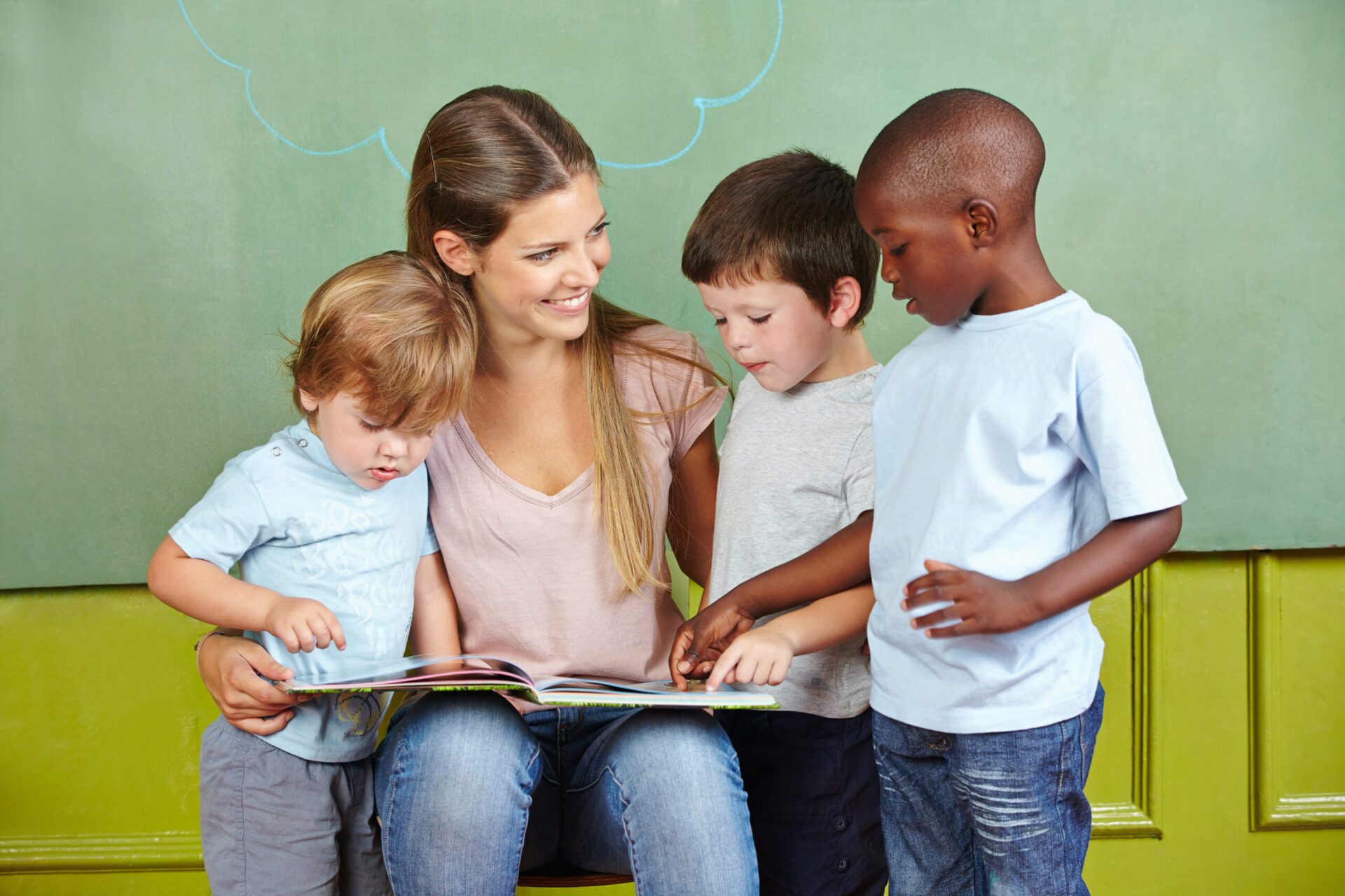 Books about adoption for teachers to read to kids. Teacher reading to children.