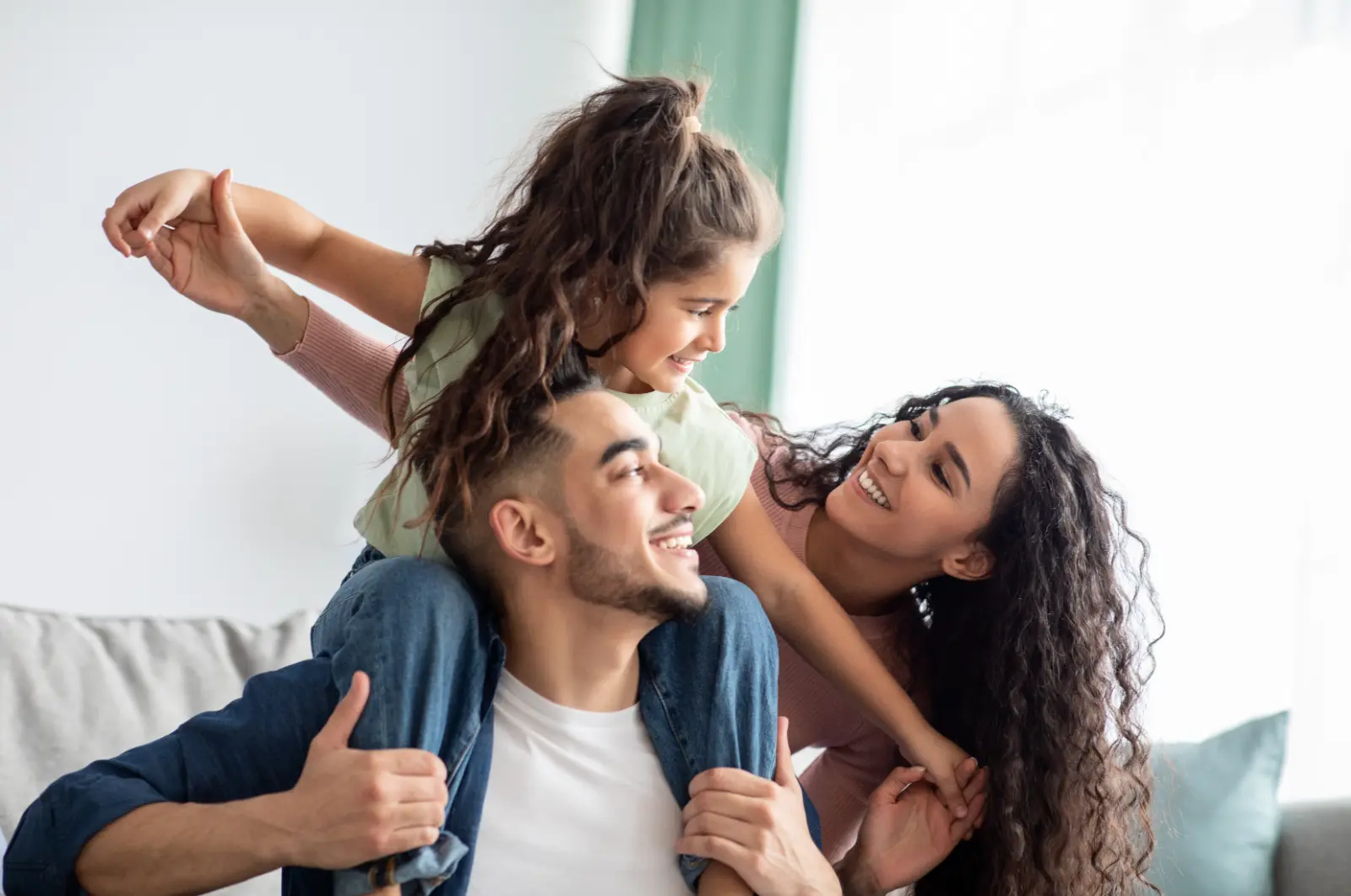 Adoption Choices. Cheerful Middle Eastern Family Of Three Having Fun Together At Home