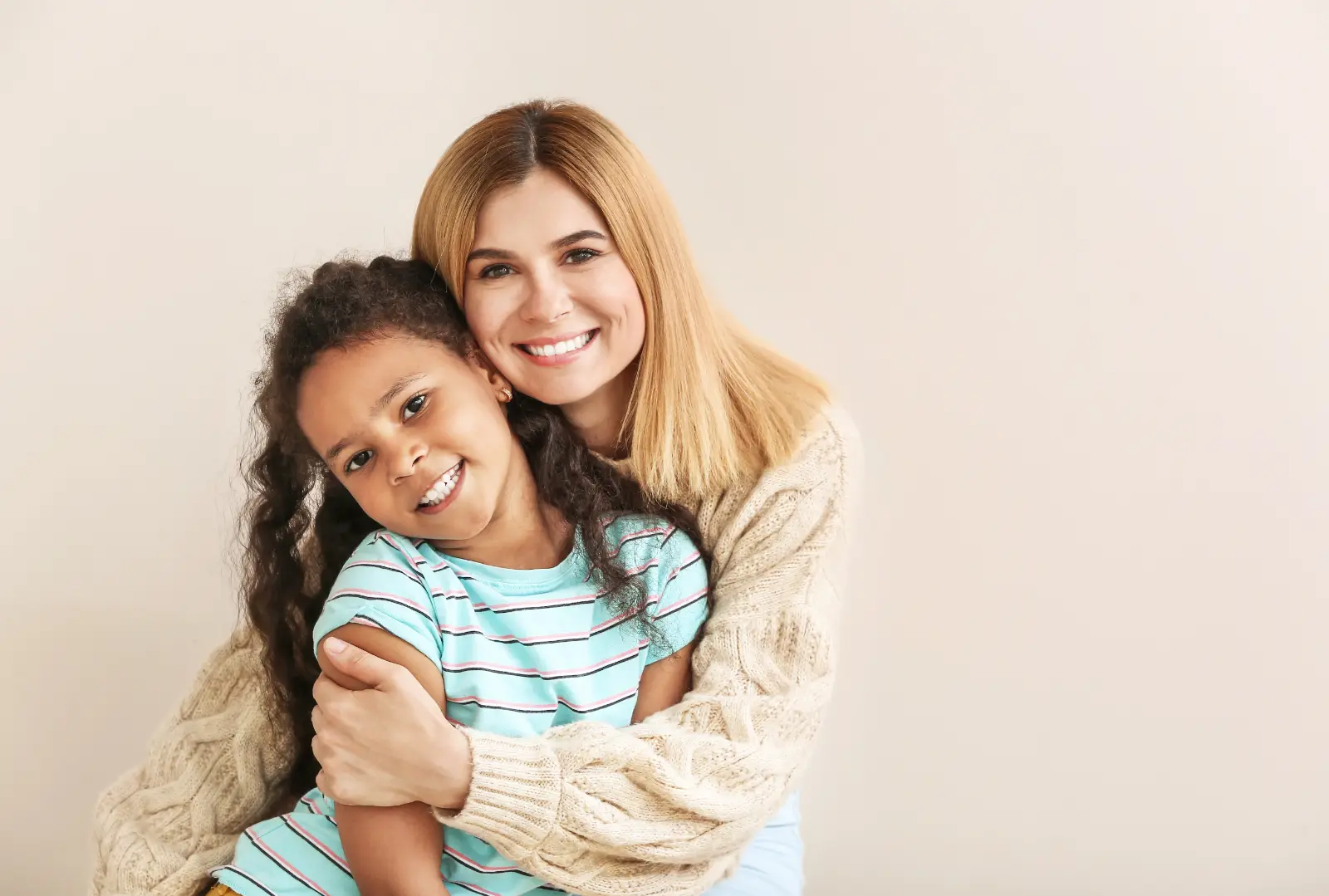 Exploring Birth Parent Rights. Happy woman with little adopted African-American girl on white background