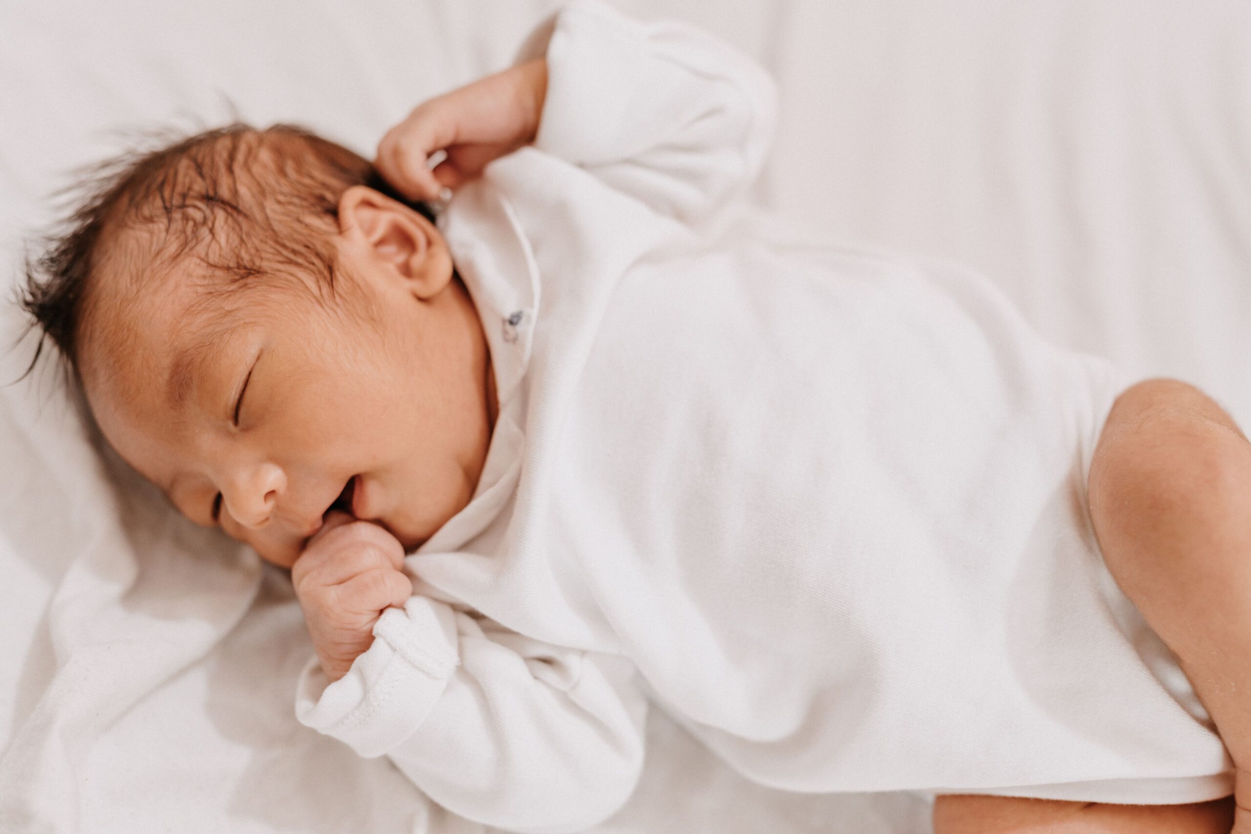 Labor and delivery nurse providing hospital adoption training best practices for a newborn