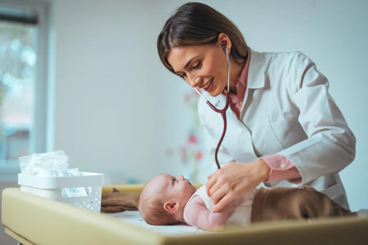 Labor and delivery nurse providing hospital adoption training best practices for a newborn